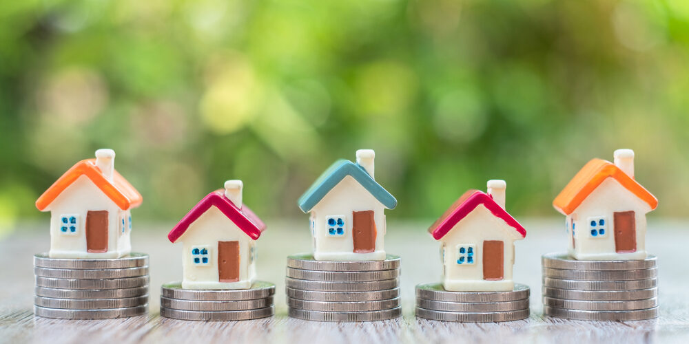 House,On,The,Coin,Ladder,Real,Estate,Concept,,Mortgage,And