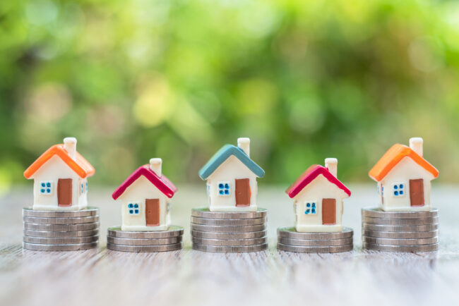 House,On,The,Coin,Ladder,Real,Estate,Concept,,Mortgage,And